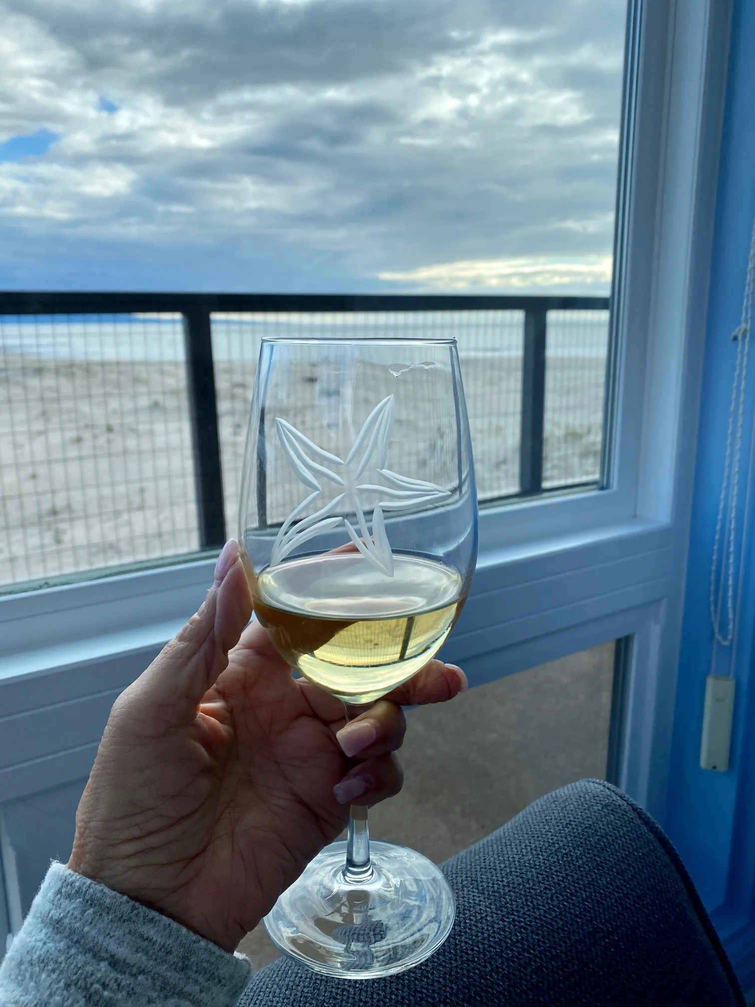 A glass of wine on the balcony