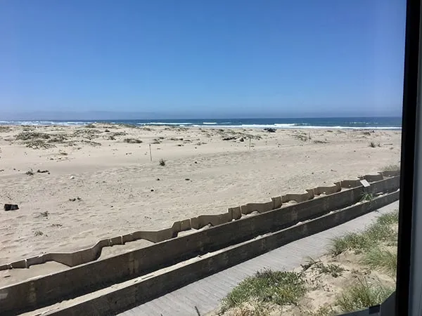 The beach, a few steps down from the master bedroom